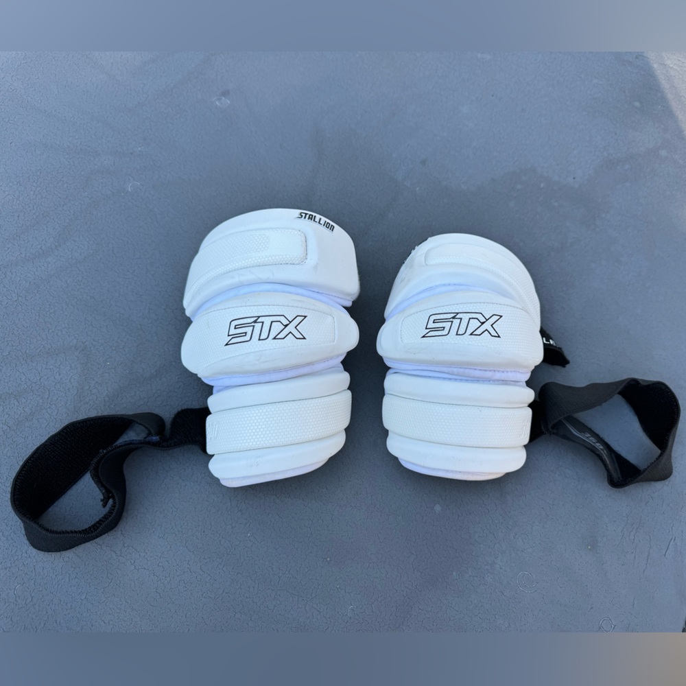 STX Stallion 300 white elbow pads with 360+ Velcro wraps